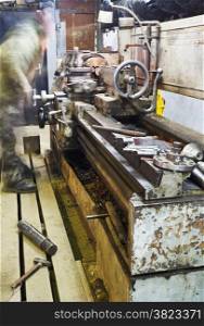 old turning lathe machine in turning workshop