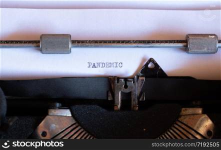 Old typewriter with the word PANDEMIC