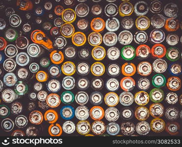 Old used batteries group. Top view background texture wallpaper. Old used batteries group. Top view background texture