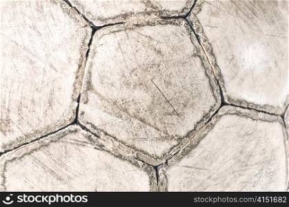 old used soccer ball close-up