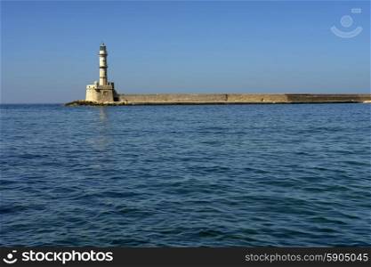 Old Venetian lighthouse on Hania port, Crete island, Greece