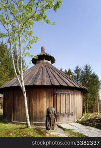 Old viking architecture with statue