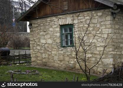 Old village house with a beautiful open window.. Old village house with a beautiful open window