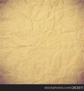 Old vintage crumpled brown page paper texture or background. Old vintage brown page paper texture or background