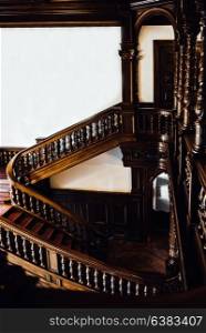 old vintage mahogany staircase with columns