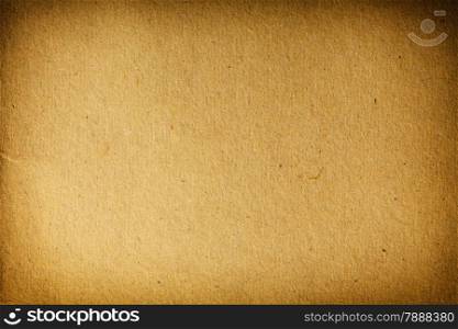Old vintage paper poster brown carton texture or background with vignette
