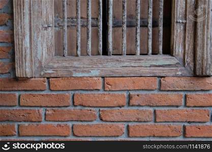 old vintage retro wooden window & brick wall