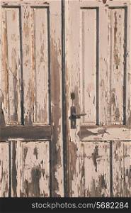 Old vintage wooden door with white paint