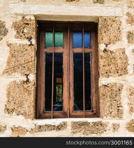 Old vitro church window in Greece