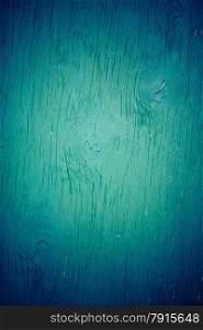 Old vivid blue grunge wooden surface background or texture