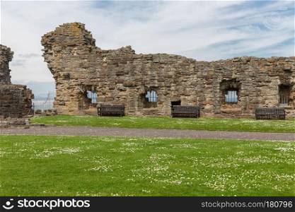 Old wall and ruin of medieval castle near North Sea in St Andrews, Scotland. Wall and ruin of medieval castle in St Andrews, Scotland