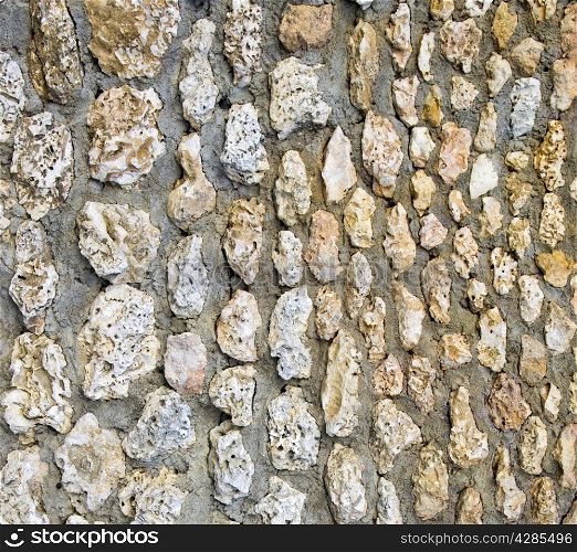 old wall of rough stones as background