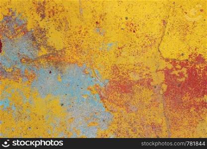 old wall with crumbling colored plaster. background, texture
