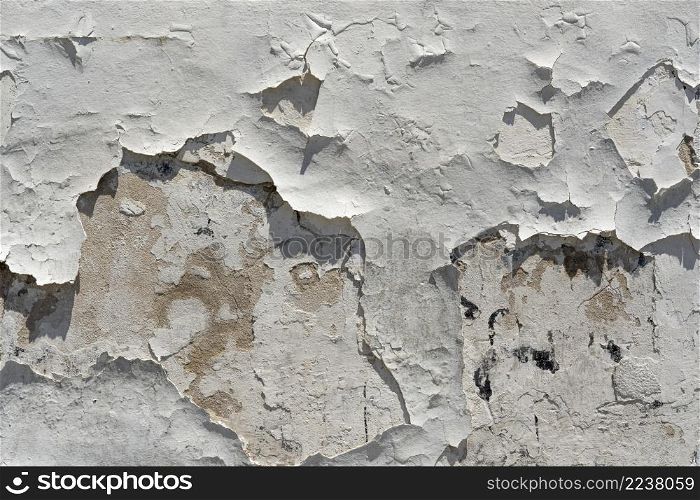 old wall with falling paint