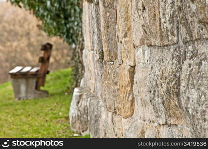 old wall with park bench