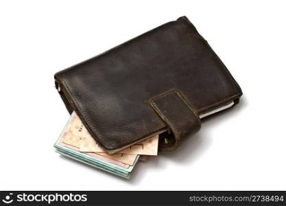 Old wallet with cash isolated on white background