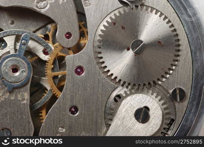 old watch - the device. The internal mechanism of watch - a photo close up