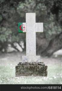 Old weathered gravestone in the cemetery - Algeria