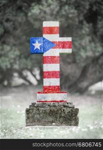 Old weathered gravestone in the cemetery - Puerto Rico