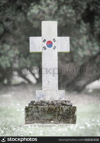 Old weathered gravestone in the cemetery - South Korea