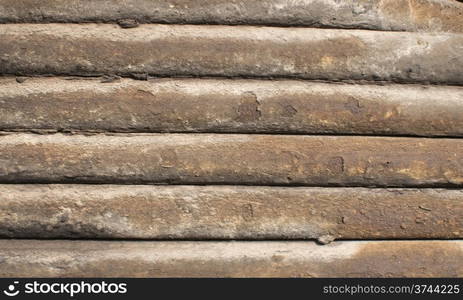 Old weathered grunge railway leaf springs closeup as background