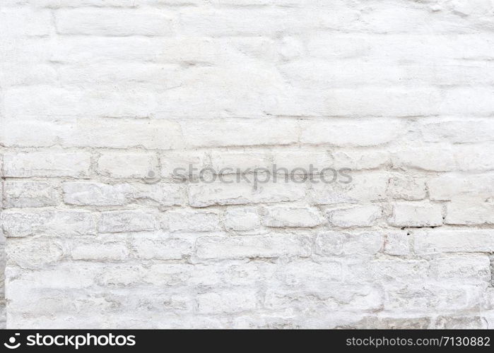 Old white brick wall texture background close up