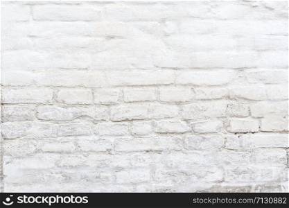 Old white brick wall texture background close up