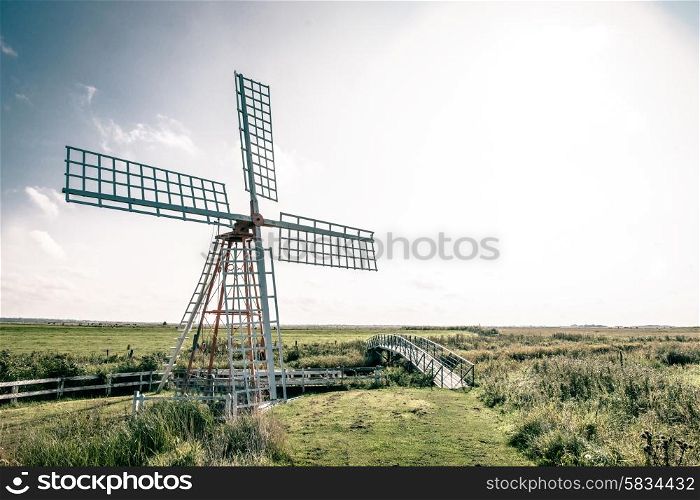 Old windmill in countryside scenery