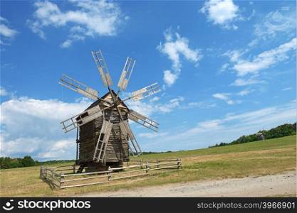 Old windmill on a picturesque hill
