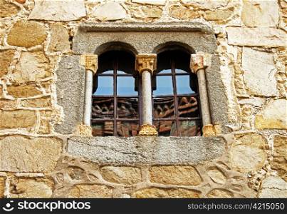 Old window in ancient house in Avila /Spain/