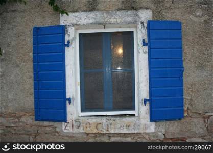Old window in the old house in Rovinj, Croatia