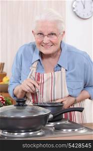 Old woman cooking