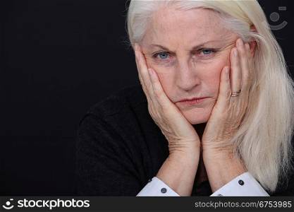 Old woman coping with loss