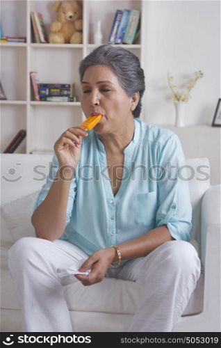 Old woman eating ice cream
