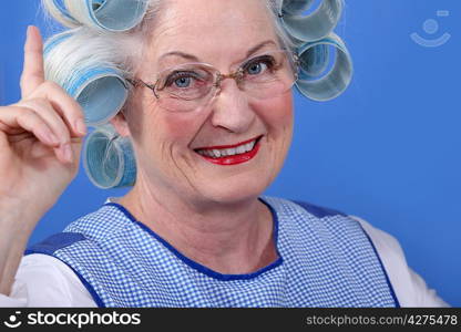 Old woman in rollers