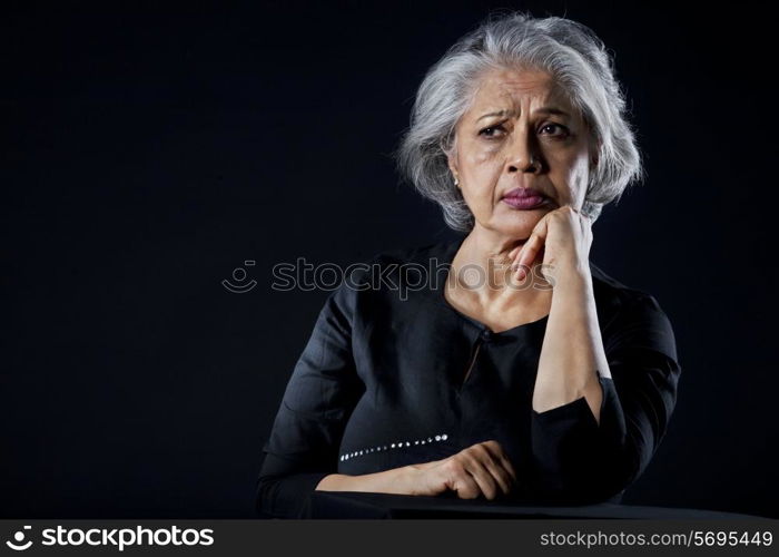 Old woman with a sad face