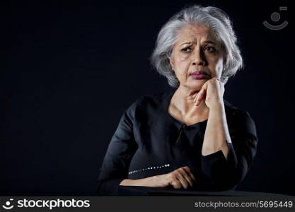 Old woman with a sad face