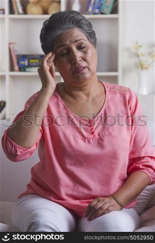 Old woman with headache