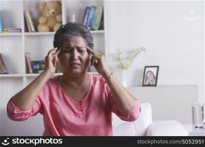 Old woman with headache