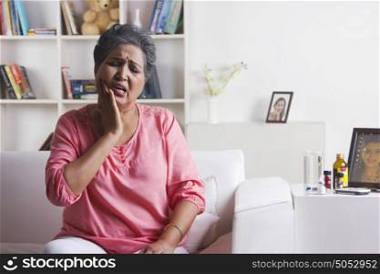 Old woman with toothache