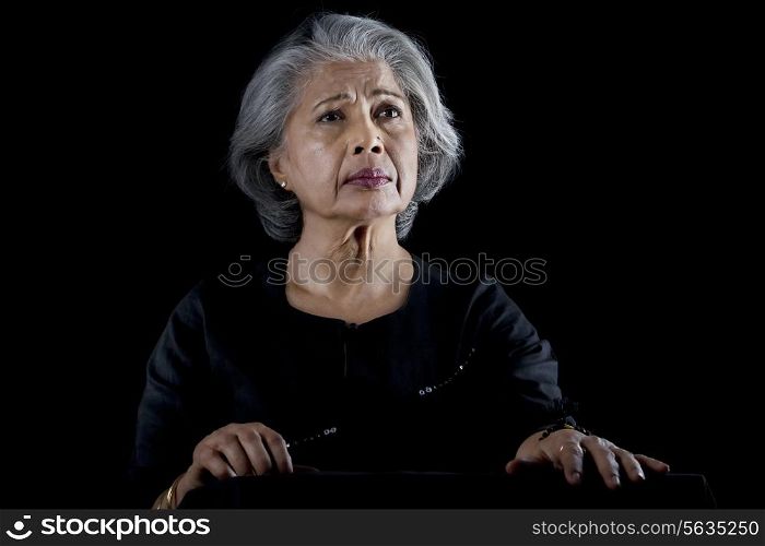 Old woman worried