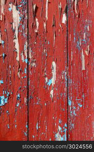 Old wood board painted red, background texture. Old wood board painted red