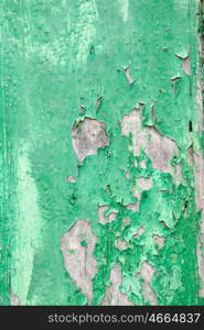 Old wood surface with green paint worn