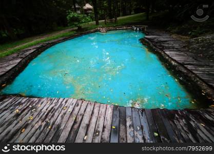 Old wooden and swimming pool