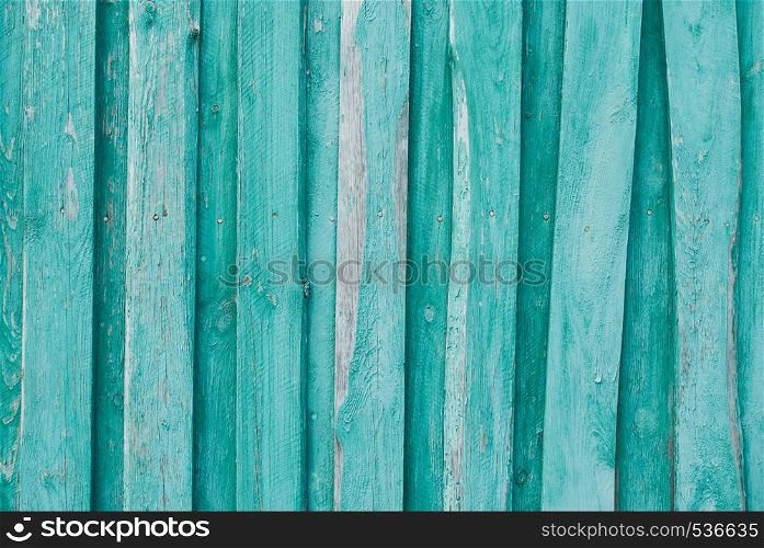 Old wooden background of boards with cracked and peeling paint. Old wooden background of boards with cracked and peeling paint. Wooden texture