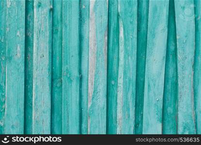 Old wooden background of boards with cracked and peeling paint. Old wooden background of boards with cracked and peeling paint. Wooden texture