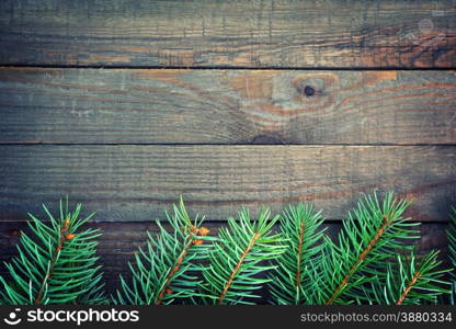 Old wooden background with pine branch, image of flooring board