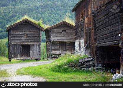 Old wooden barns in farm in Norway