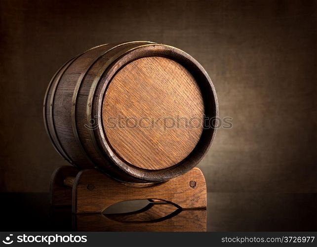 Old wooden barrel on a background of canvas