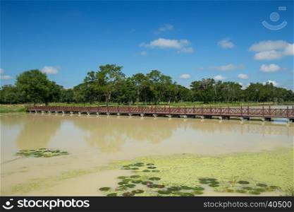 Old wooden bridge in sukhothai historical park, Thailand